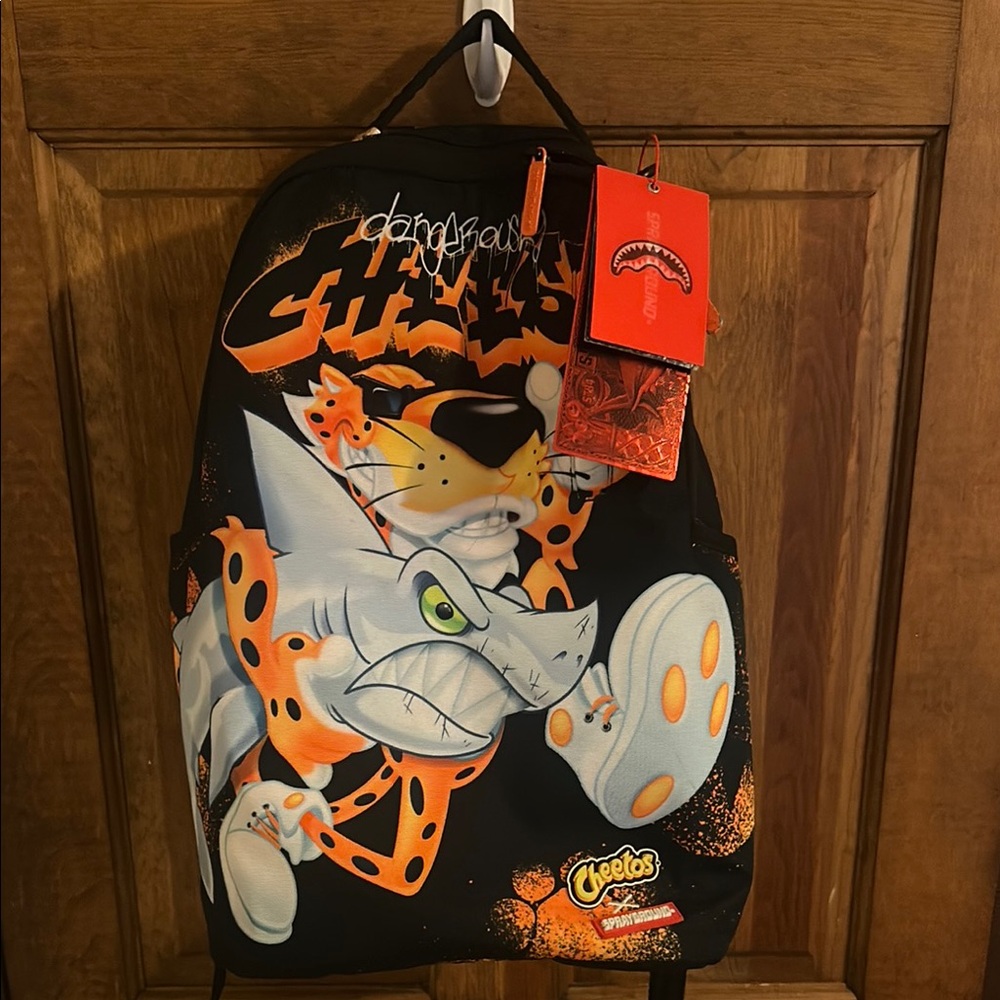 Sprayground Black and Orange Cheetos Backpack